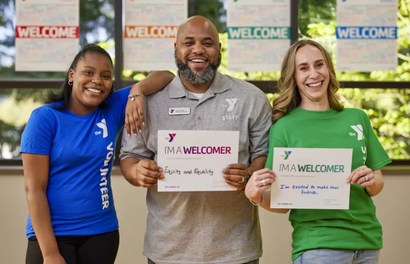 Staff welcoming newcomers at the Y
