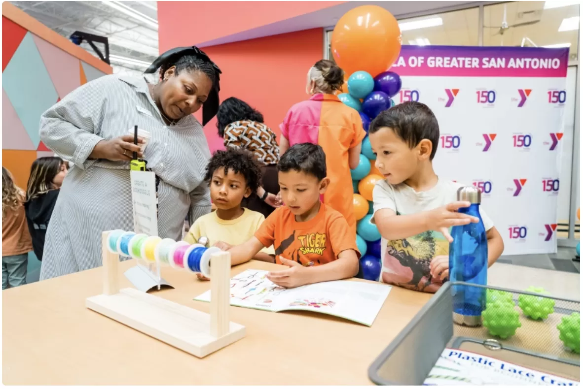 Children play at the new Immersive DoSeum Space at the Mays Family YMCA at Potranco