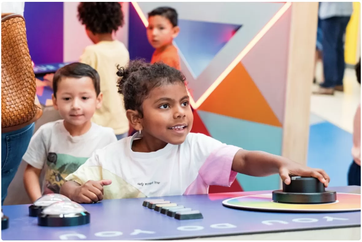 Children play at the new Immersive DoSeum Space at the Mays Family YMCA at Potranco