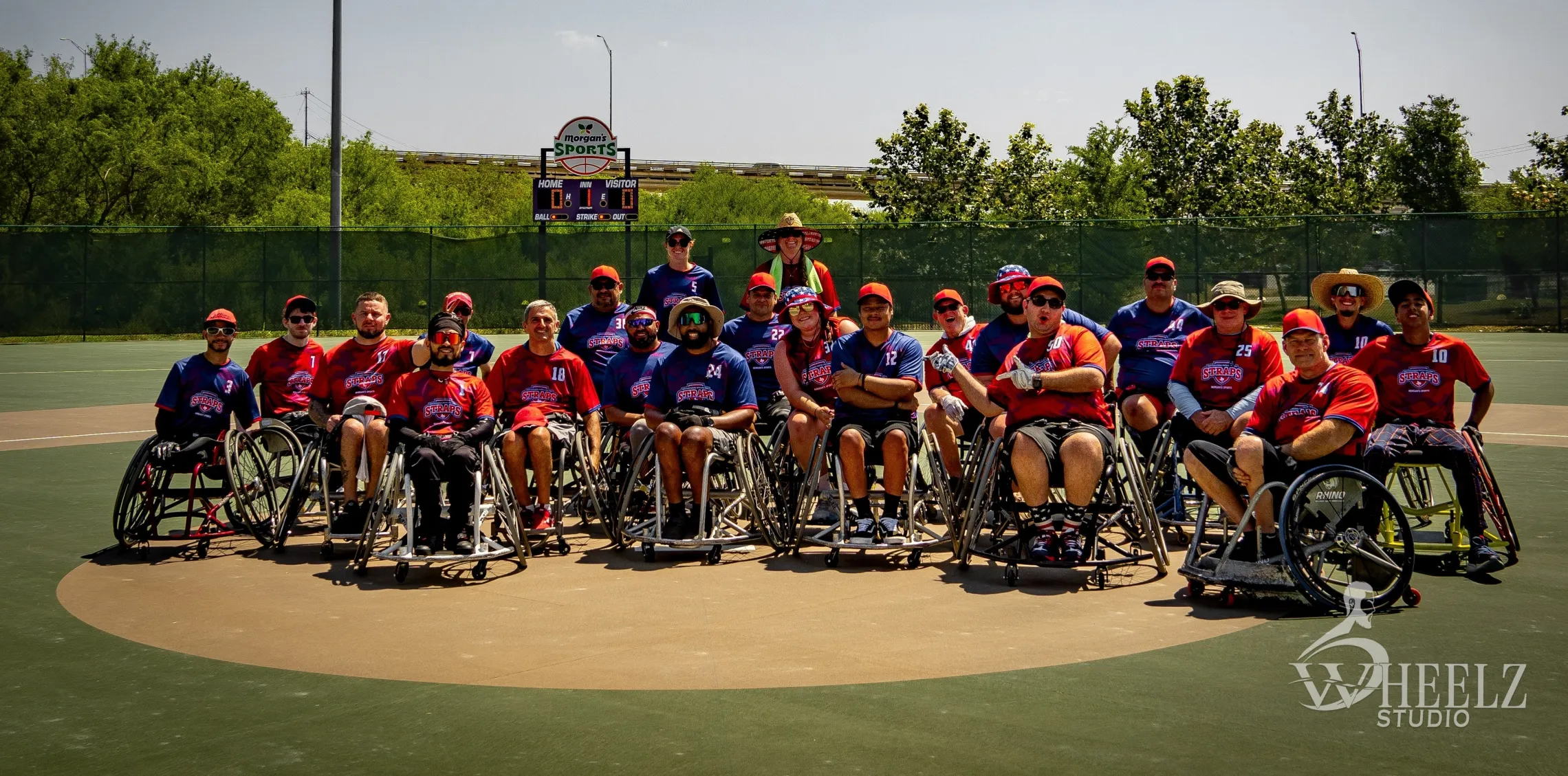 Baseball Participants playing baseball in wheel chairs - STRAPS Program