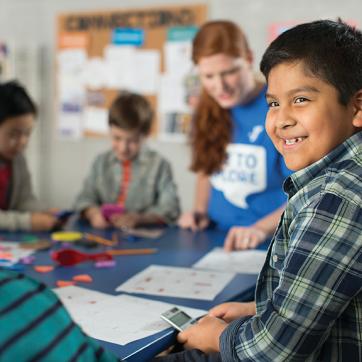 Child doing homework during Y Afterschool