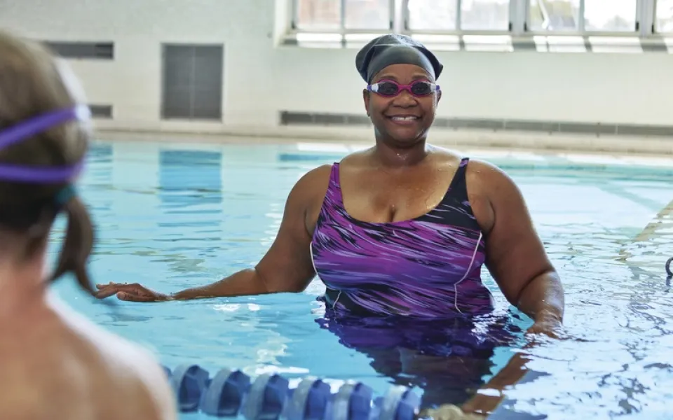 Lady enjoying a YMCA Water Aerobic Class