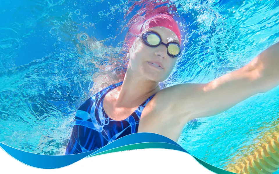 Underwater image of a woman swimming in a pool