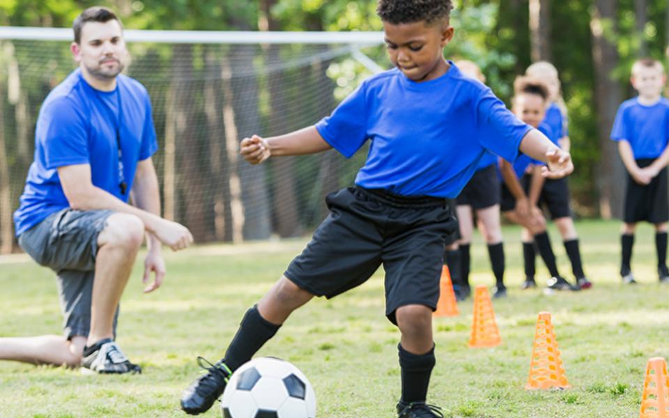 Boy playing soccer